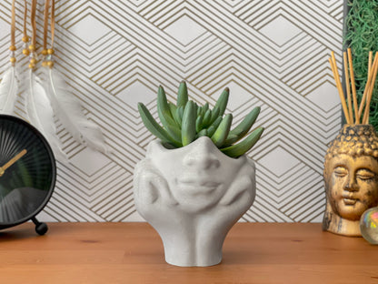 Face Succulent Planter on Two Hands